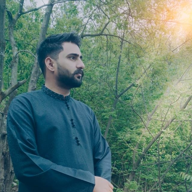 Haris Khurshid working at desk